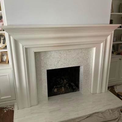 white on white indoor fireplace installation project completed by Alpine Fireplaces