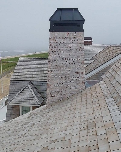 Ceiling view of chimney stack for beachside residential home installation, maintenance, and repairs from Alpine Fireplaces