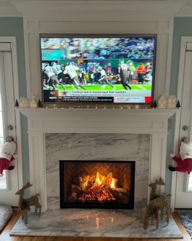 Active fireplace over wall mounted tv