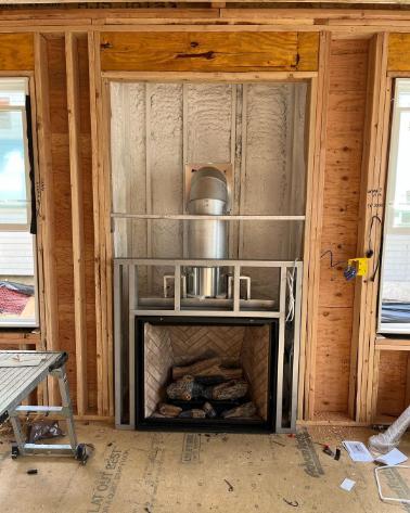 Completing a new fireplace installation in residential home from Alpine Fireplaces