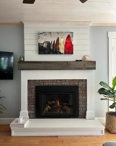talk ceilings combined with a fireplace chimney make your home look beautiful. Contact Alpine Fireplaces.