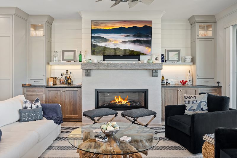 home interior decor beautified with tv wall mounted over fireplace installation from Alpine Fireplaces